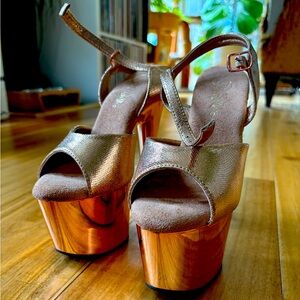 Rose Gold Chrome Pleasers 6” heels, protector sleeves and box incl